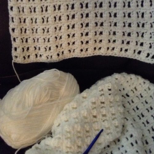 white crochet curtain with white yarn
