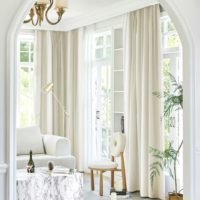 cour cream blackout curtains in living room