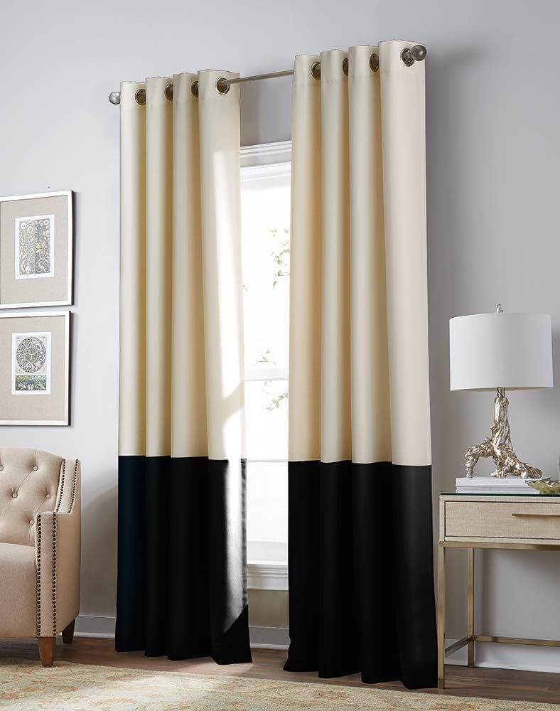 black and cream curtains hanging in living room